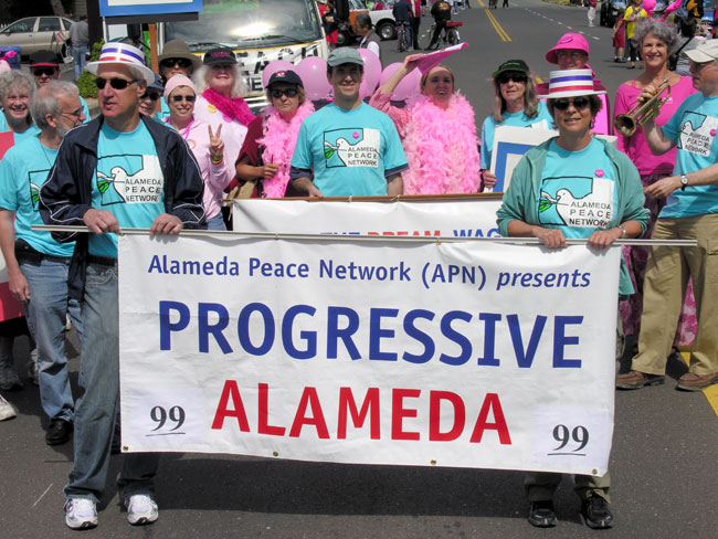 APN marches in the 4th of July
		parade